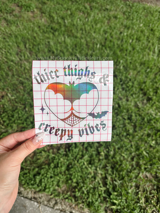 Thicc thighs and creepy vibes Vinyl Decal