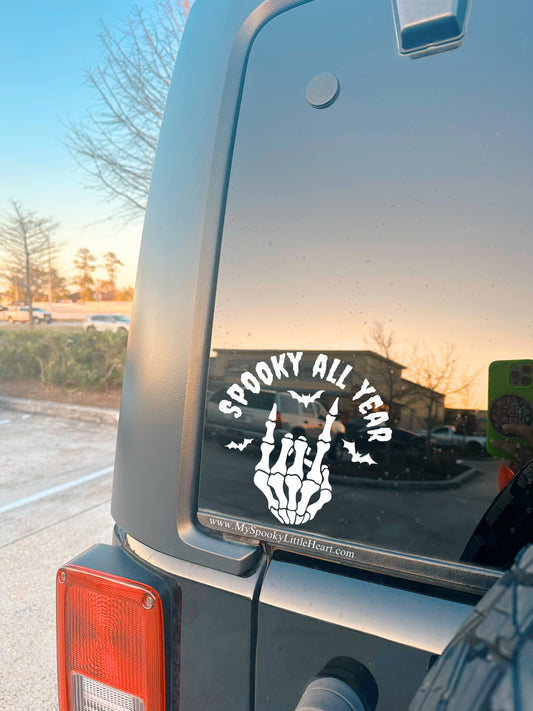 Spooky All Year Skeleton Rock on Hand with Bats Vinyl Decal