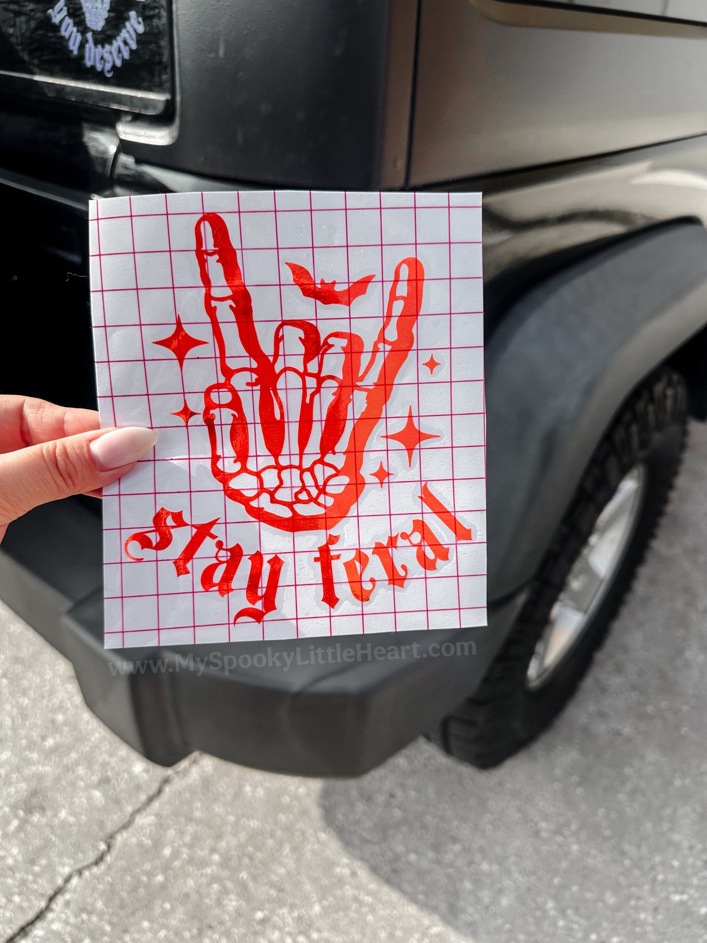 Stay Feral Skeleton hand rock on Vinyl Decal